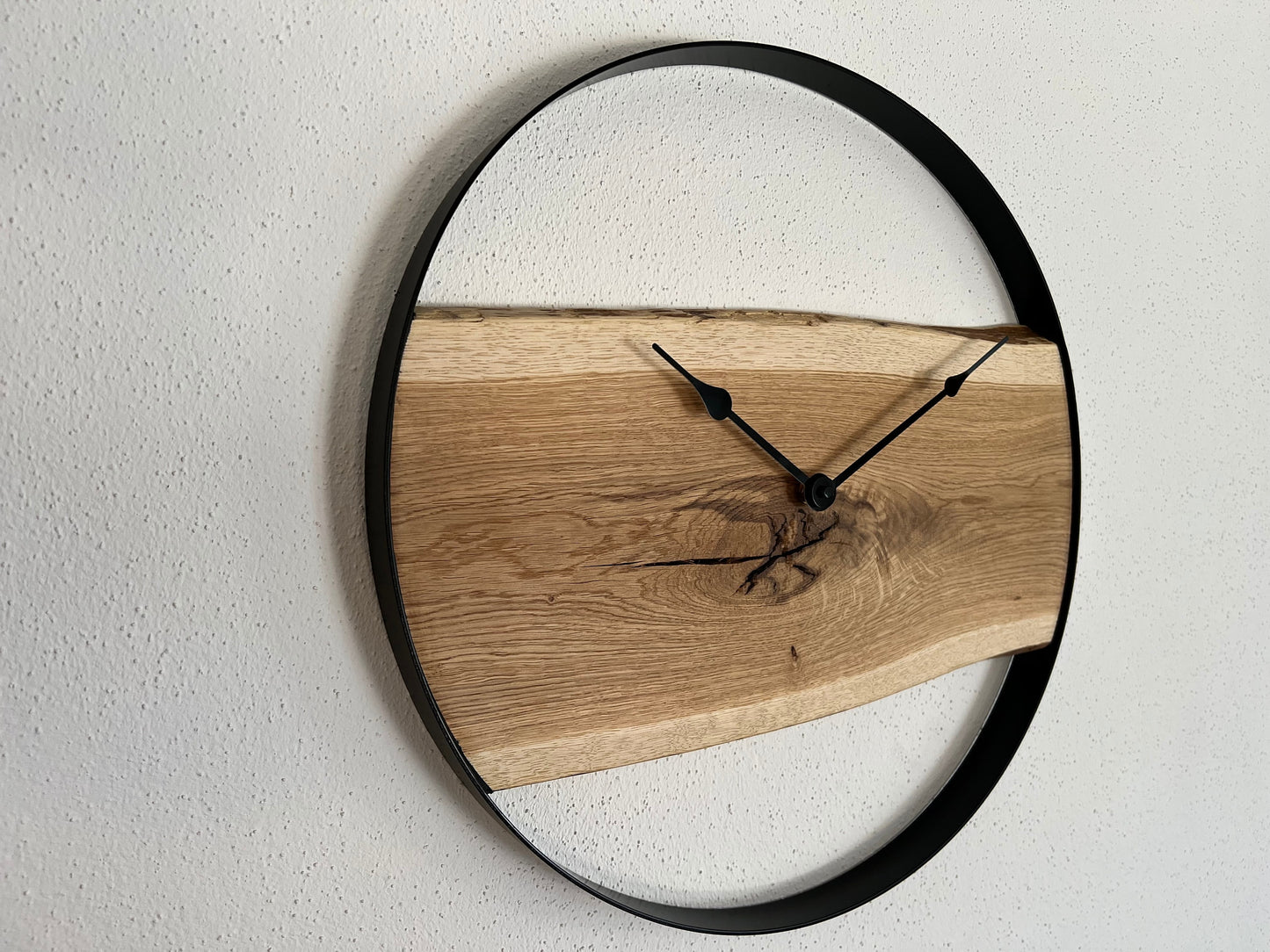 Wall clock made of solid oak