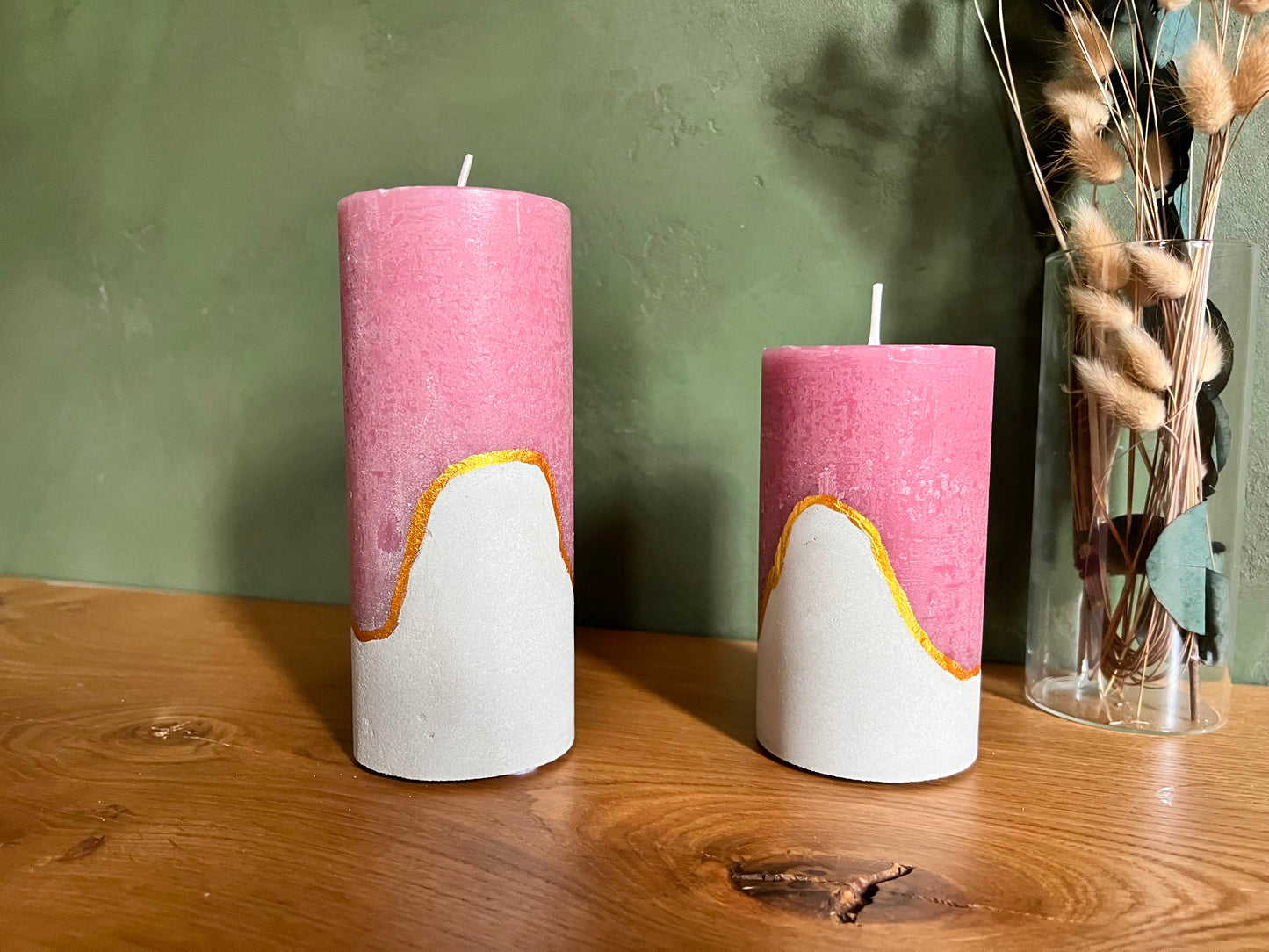 Decorative candles with concrete base in pink