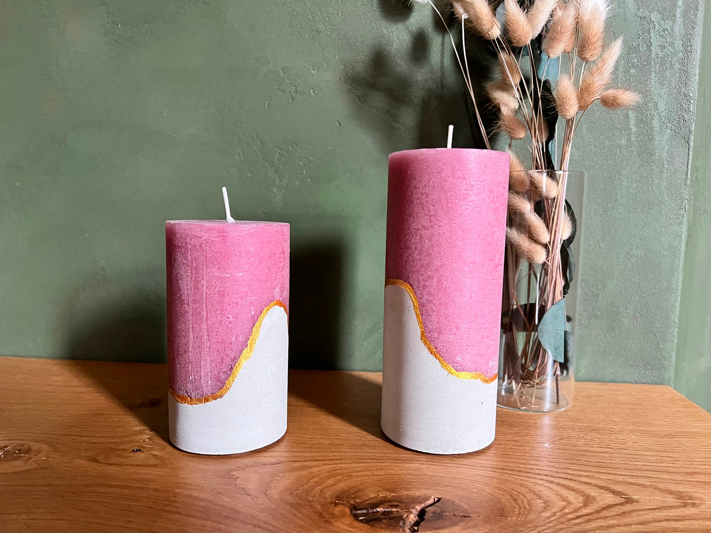 Decorative candles with concrete base in pink