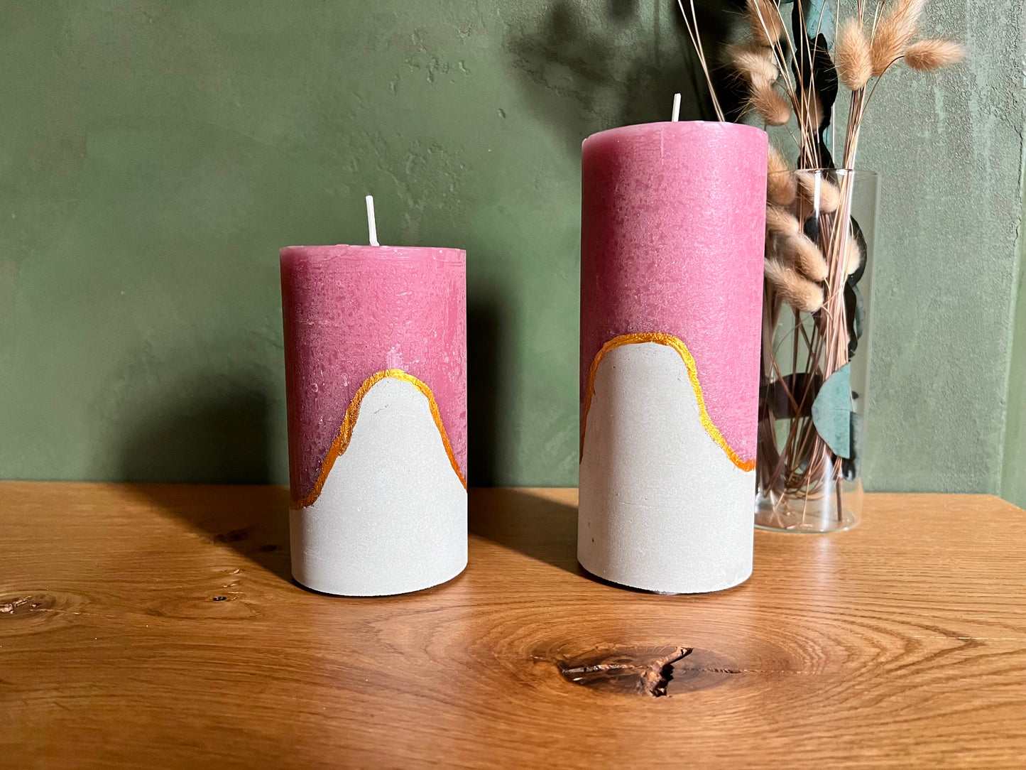 Decorative candles with concrete base in pink