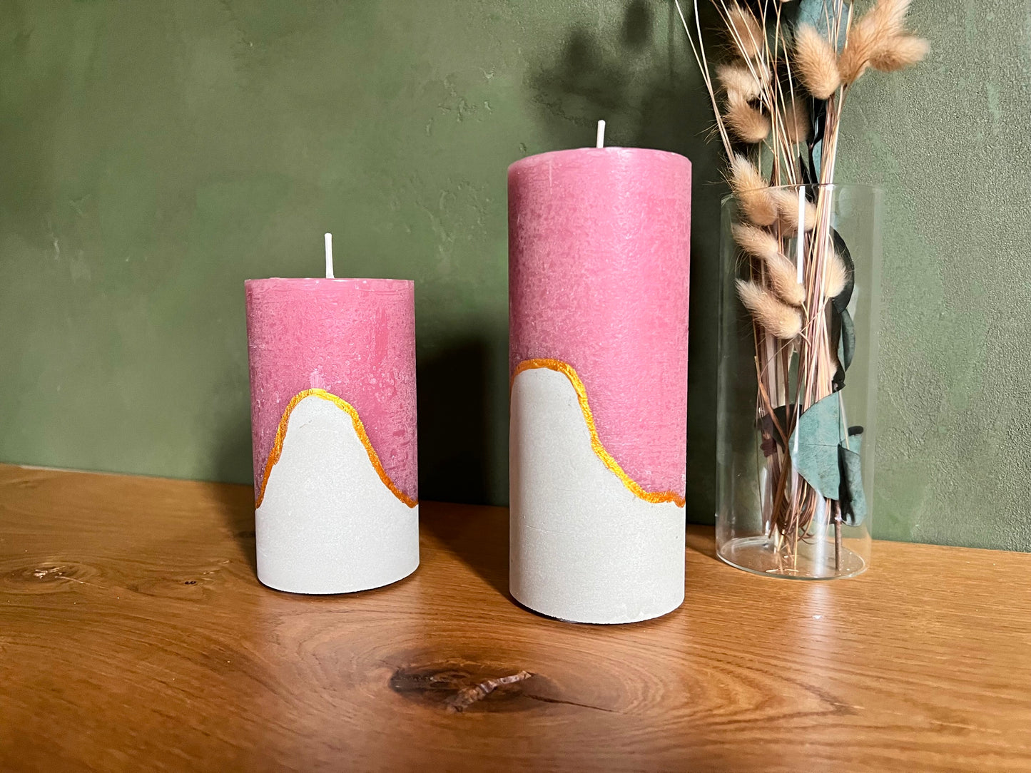 Decorative candles with concrete base in pink