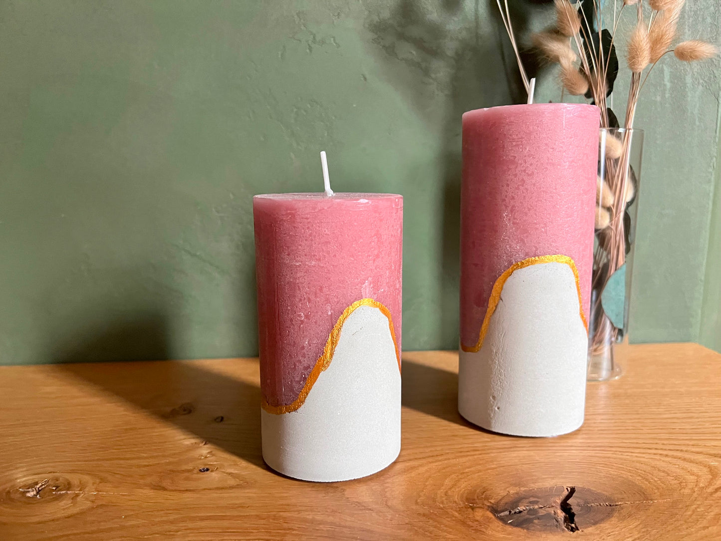 Decorative candles with concrete base in pink