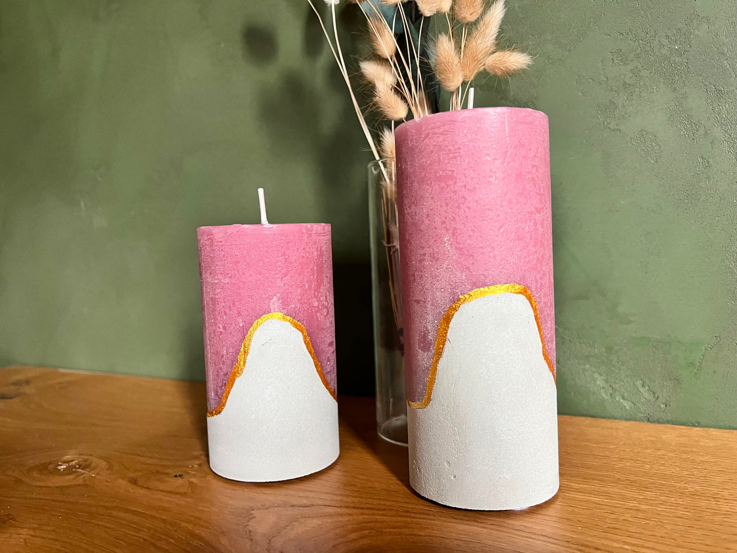 Decorative candles with concrete base in pink