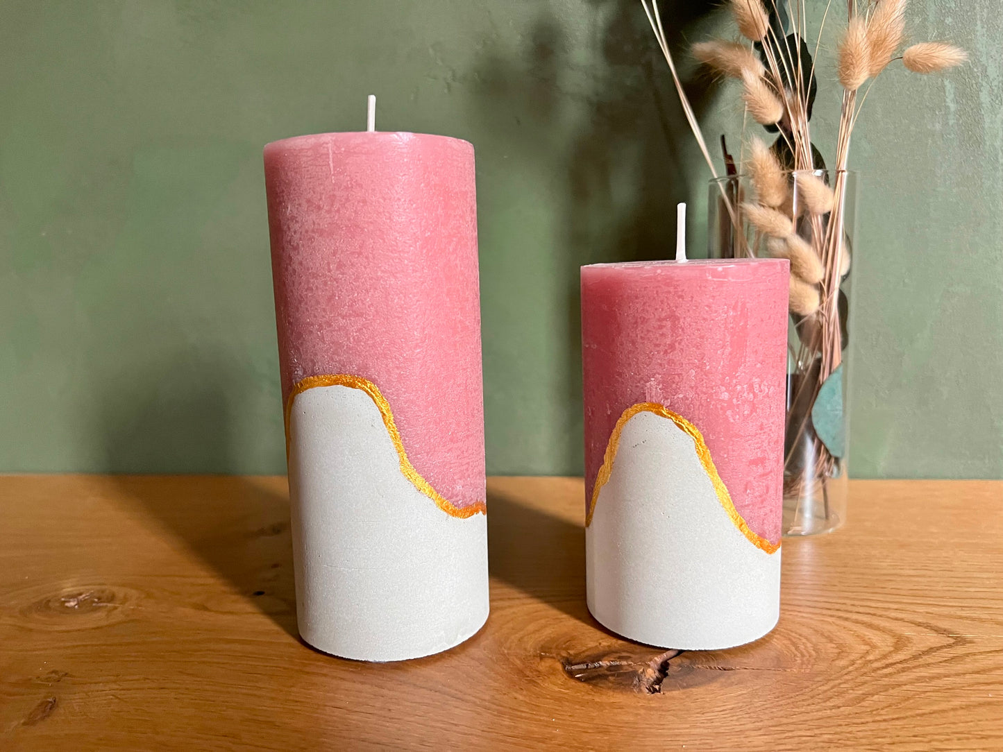 Decorative candles with concrete base in pink